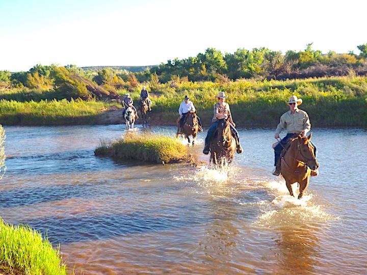 Horseback riding on a ranch vacation