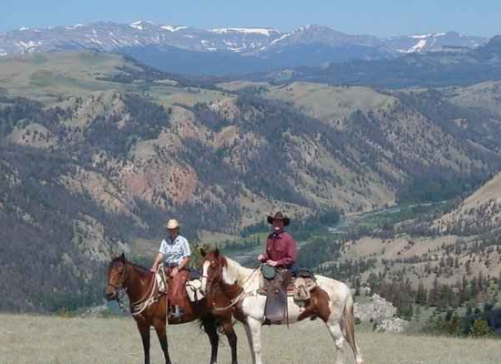 Lazy L&B ranch riders and view